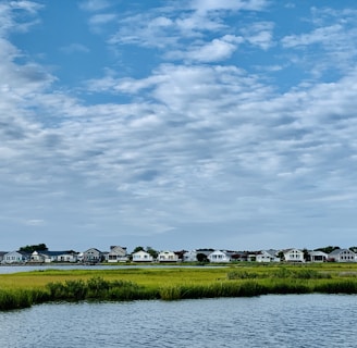 body of water across houses