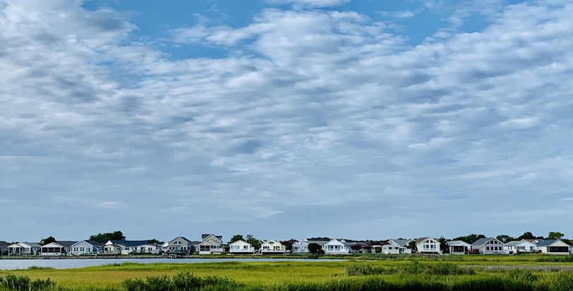 body of water across houses