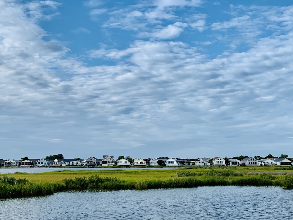 body of water across houses