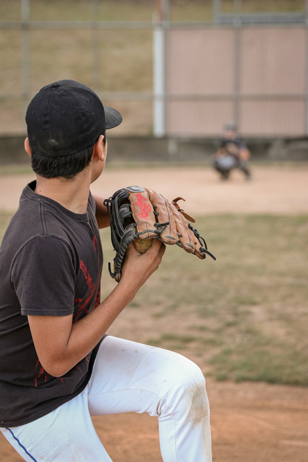 man about to throw the baseball at the field