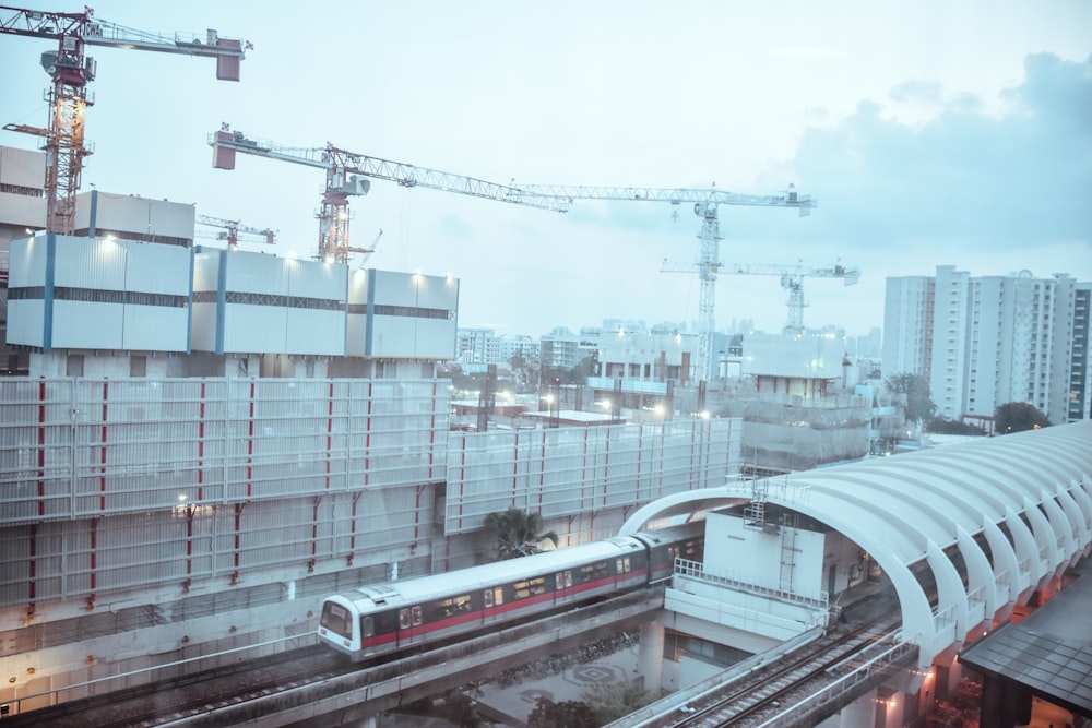 aerial photography of a train passing by a railroad