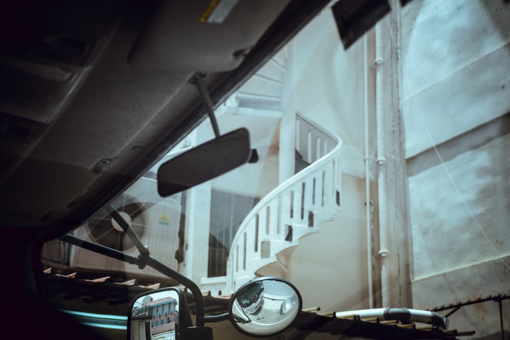 a view of the inside of a vehicle through a mirror