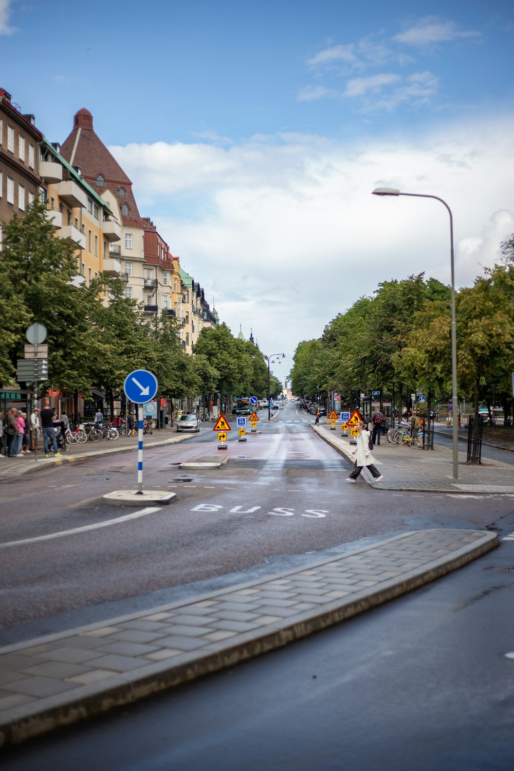 person crossing street during daytime