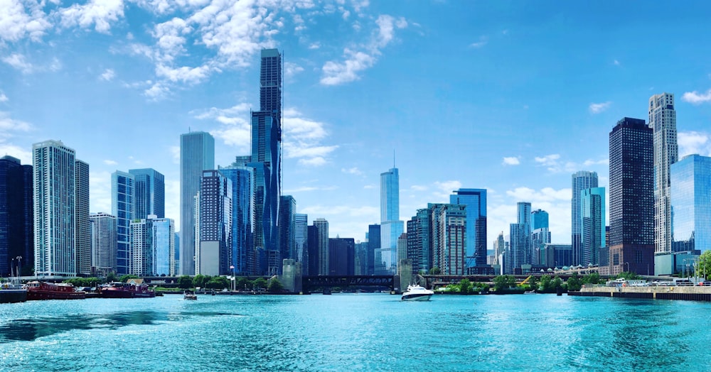 body of water near buildings at daytime