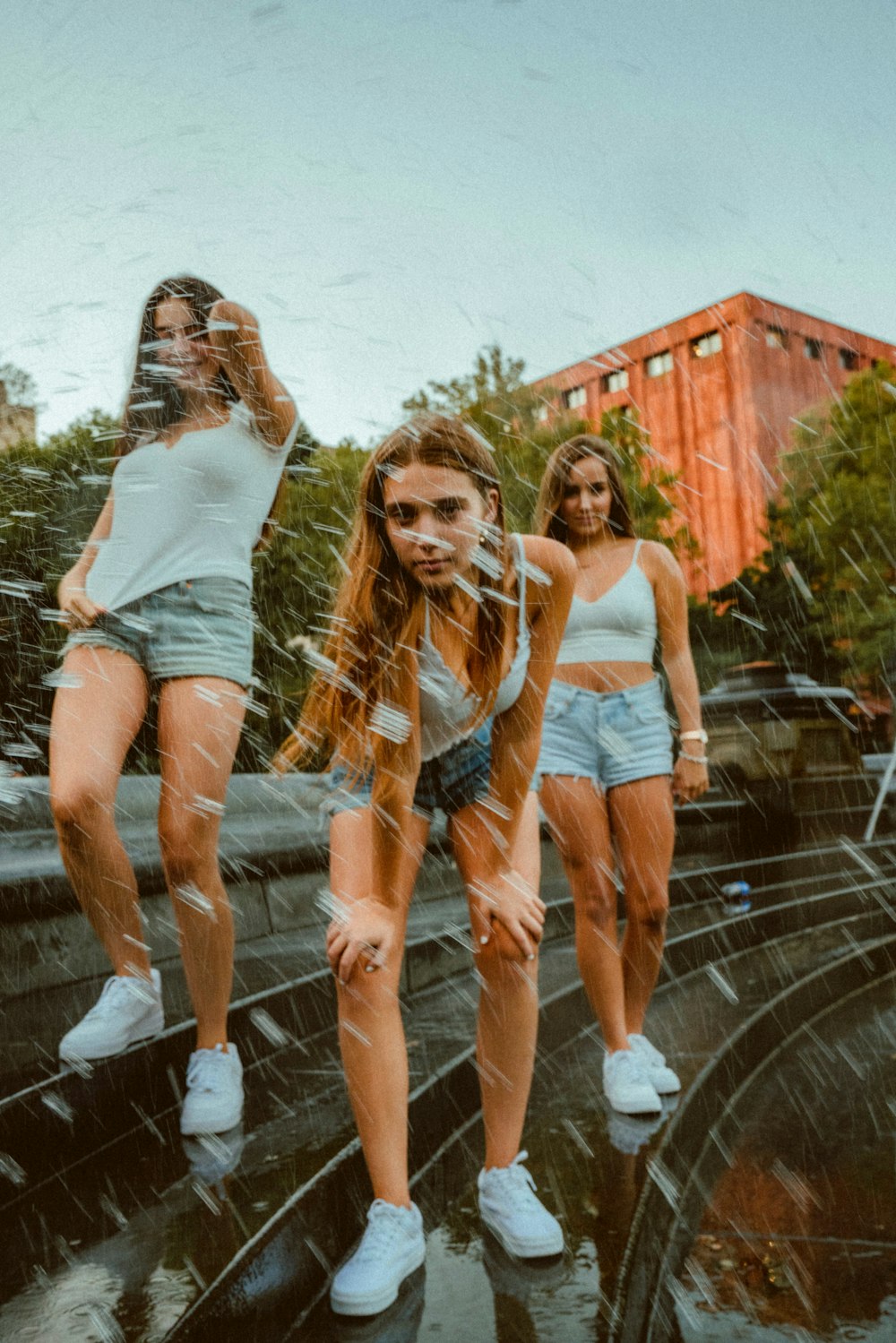 three women near fountain