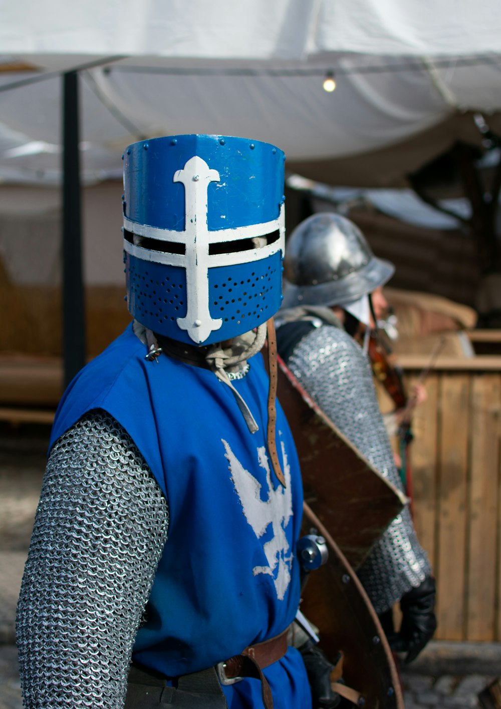 man wearing blue and grey costume