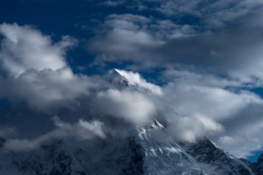 white clouds covered mountain