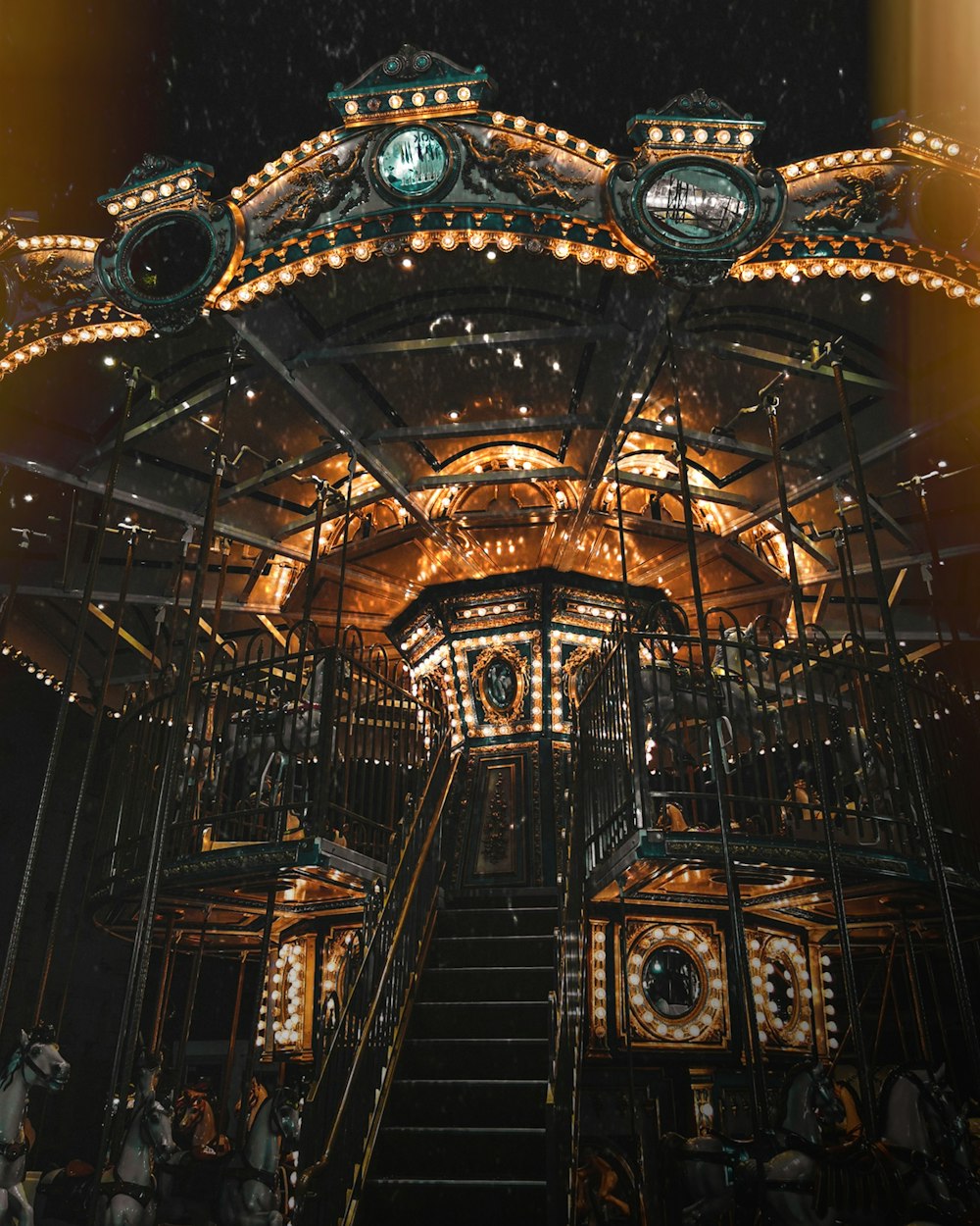 low-angle photography of gray and orange carousel