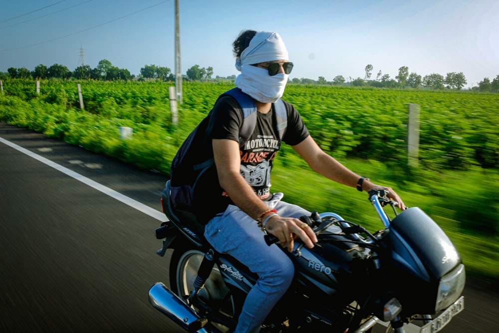 man riding motorcycle during daytime