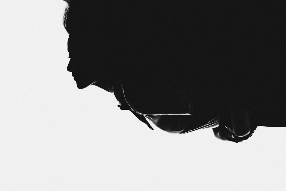 silhouette of woman on white background