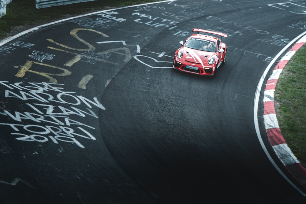 red sports car on race track