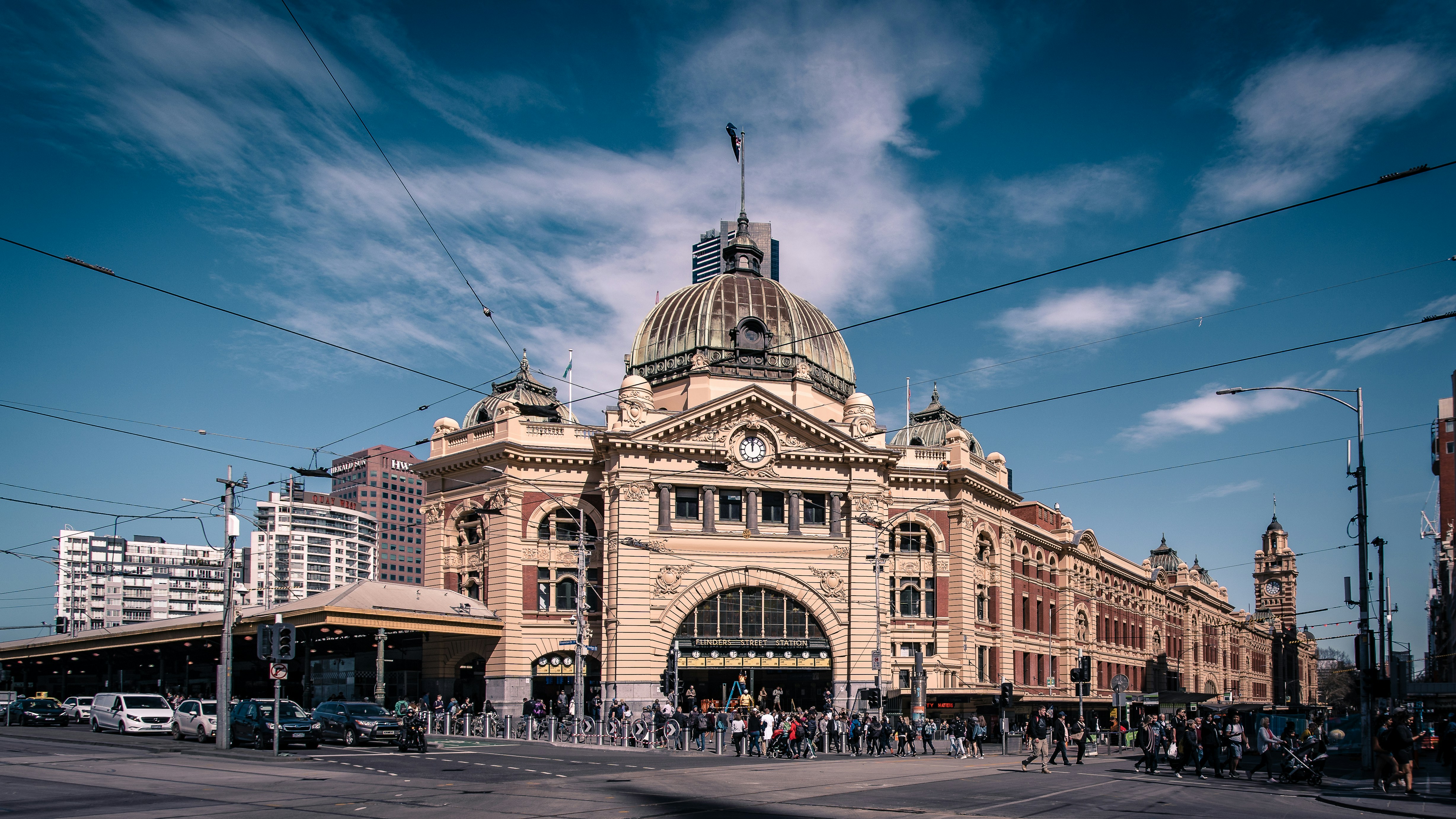 people walking besidechurch
