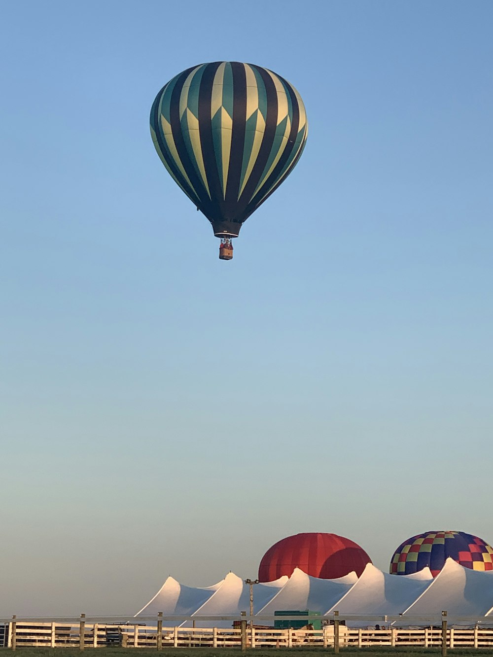 black and gray hot air balloon under blue sky