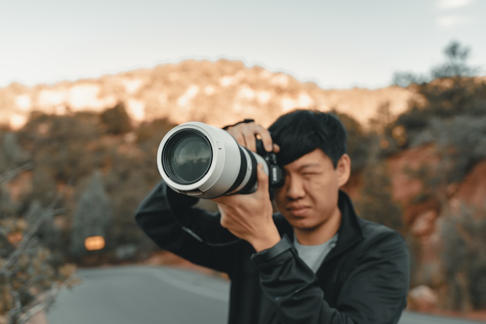 white and black DSLR camera