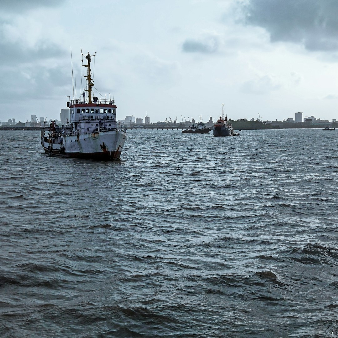 white ship on sea at daytime