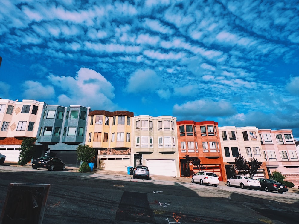 vehicles parked beside buildings