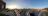Panoramic view of Bogotá city skyline from an elegant event hall at Club La Aguadora during sunset.