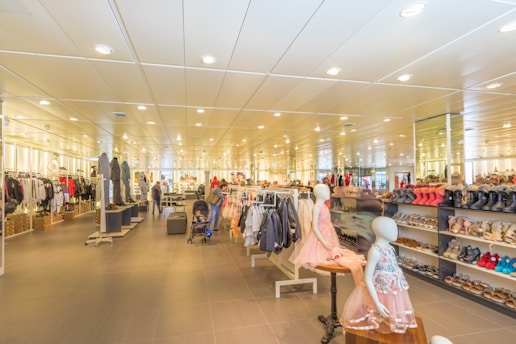 Colorful children's clothing displayed in a cheerful retail environment