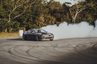 time-lapse photography of a drifting car