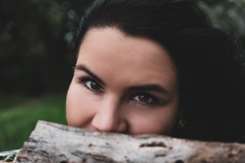 Mysterious gaze over wood