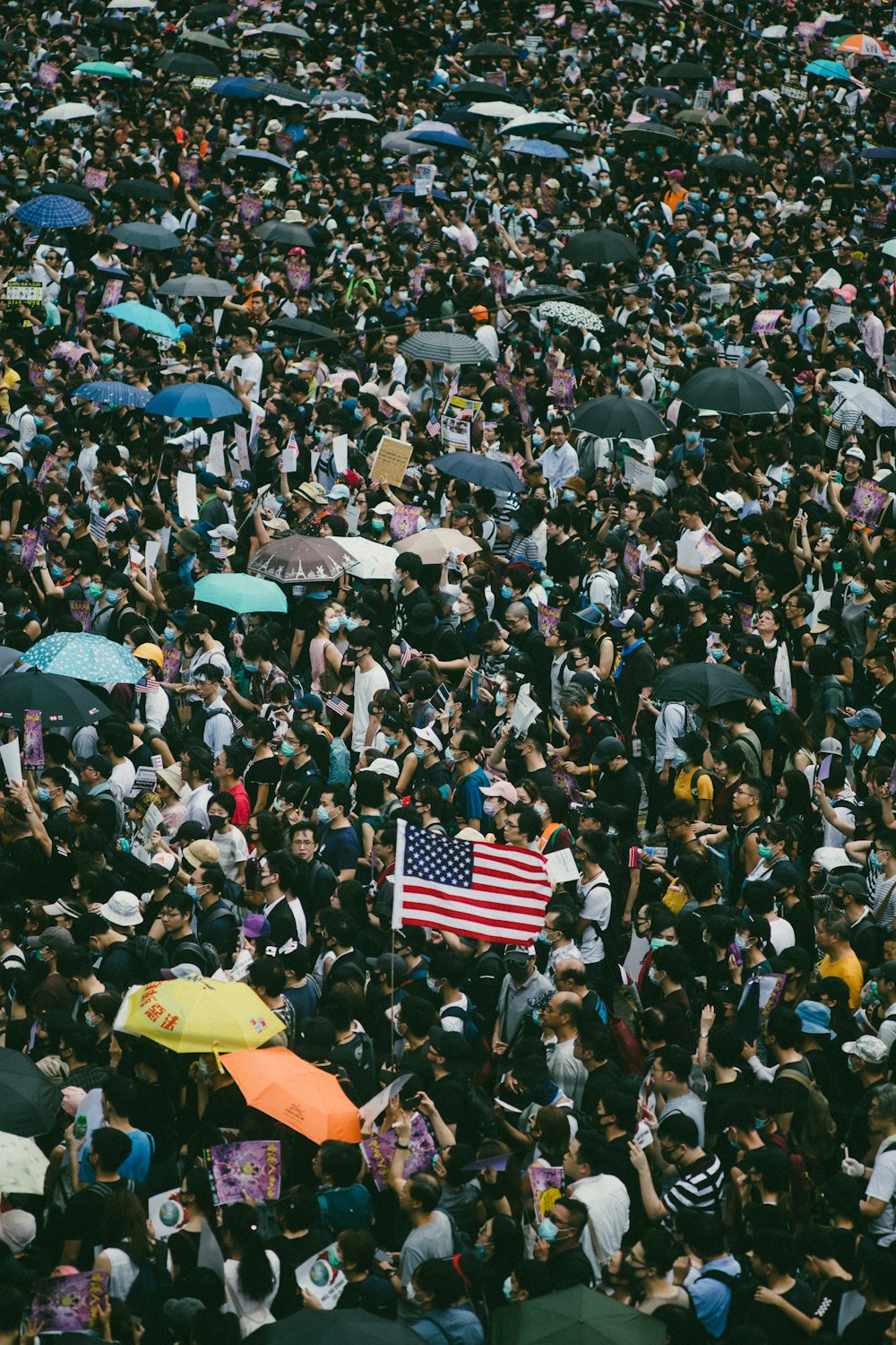 USA flag held by people