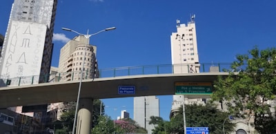 Gameplay moment showing a character navigating a cityscape with educational tasks.