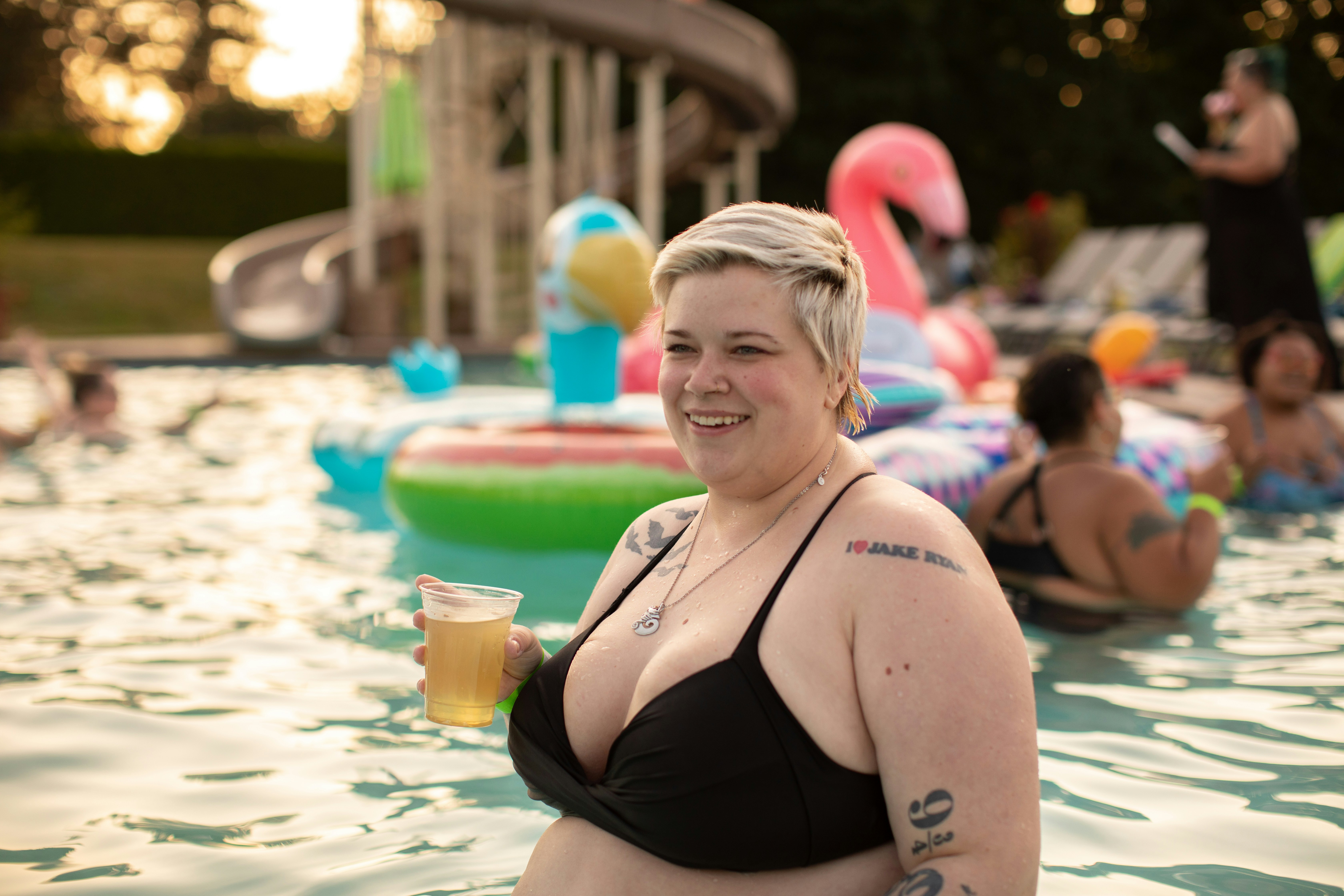 Plus size woman at a pool party