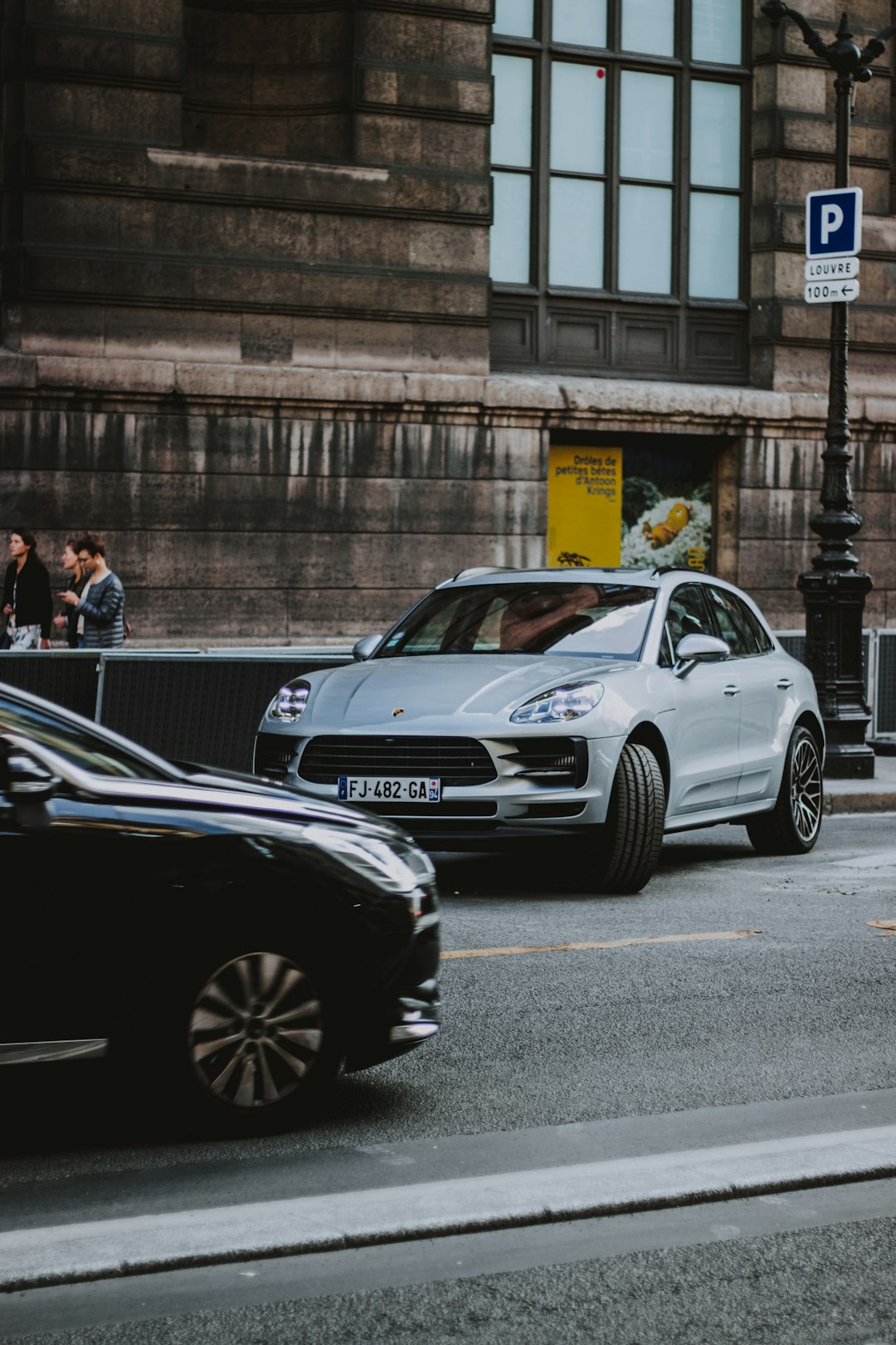 gray sedan on road