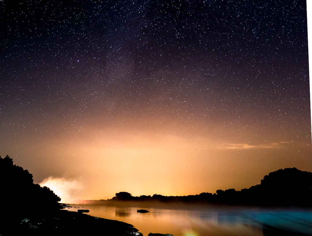 silhouette photo of lake