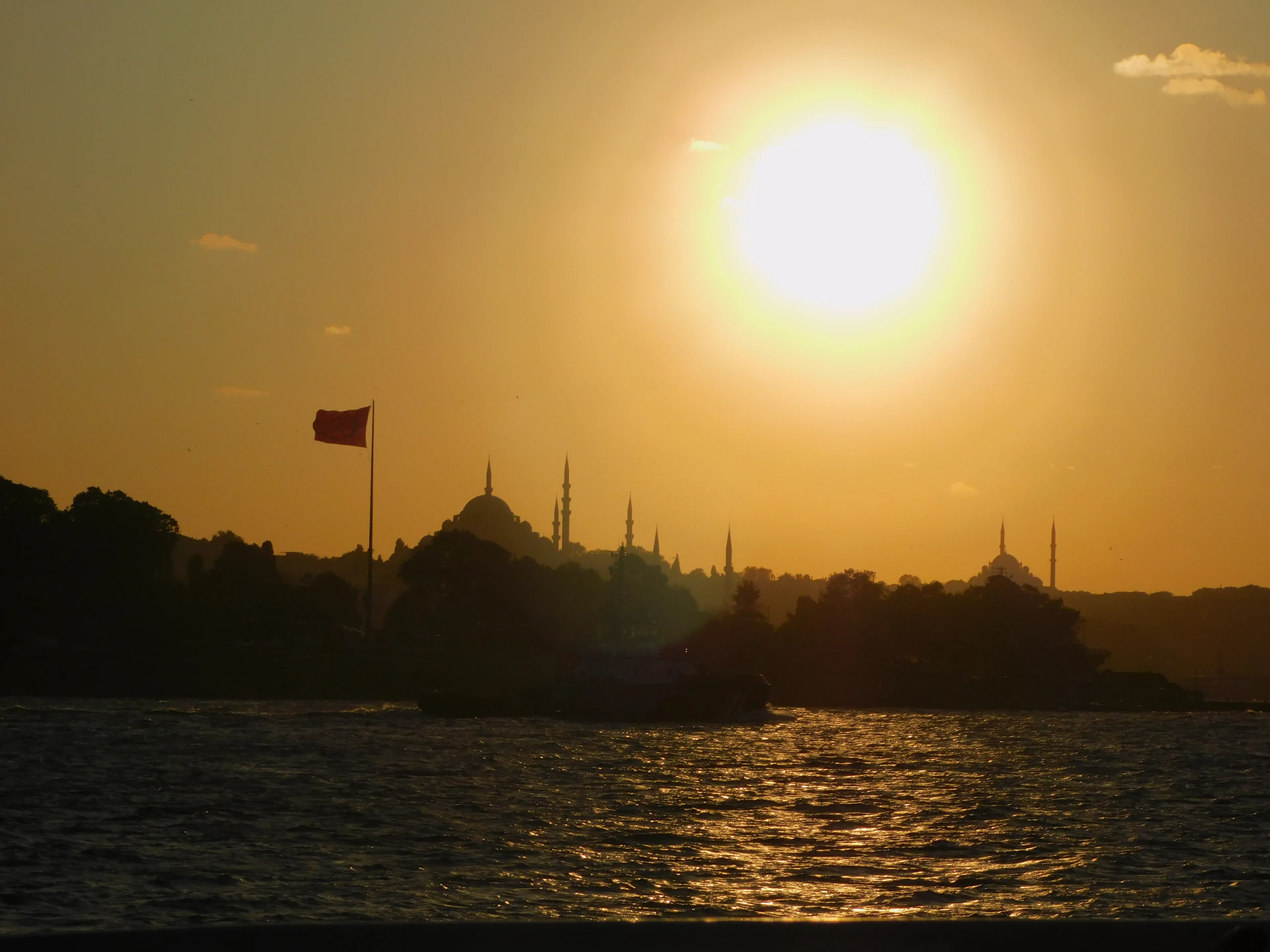 woman wearing yellow long-sleeved dress under white clouds and blue sky during daytime