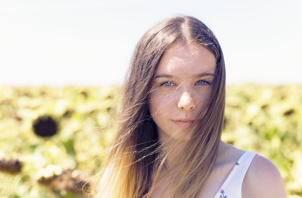 woman in sunflower field