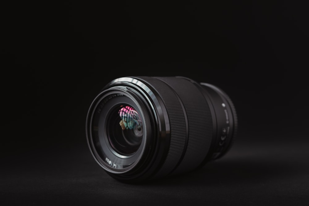 black DSLR camera zoom lens