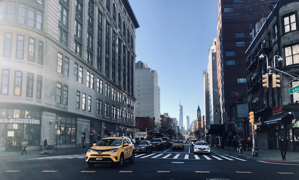 yellow SUV on road