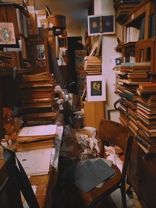 Piles, stacked, mess, chaos, lost, no space, disorder, clutter, jumble, disarray