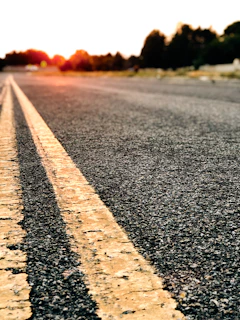 black and yellow asphalt road