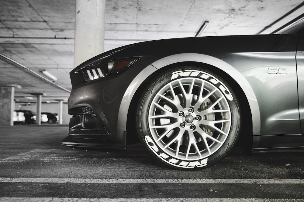 grayscale photography of parked vehicle