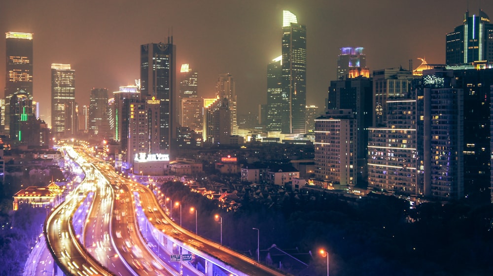 timelapse photography of building and roadway during nighttime