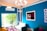 A freshly painted living room showcasing vibrant colors and modern decor.