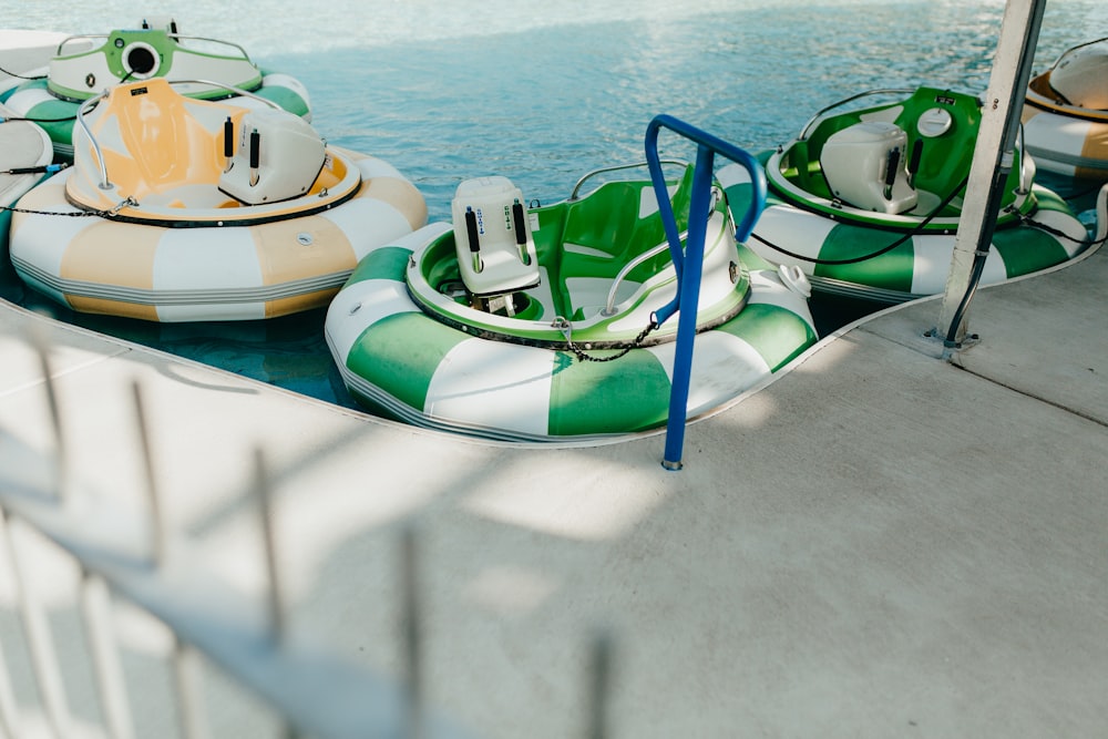 round green and orange boats