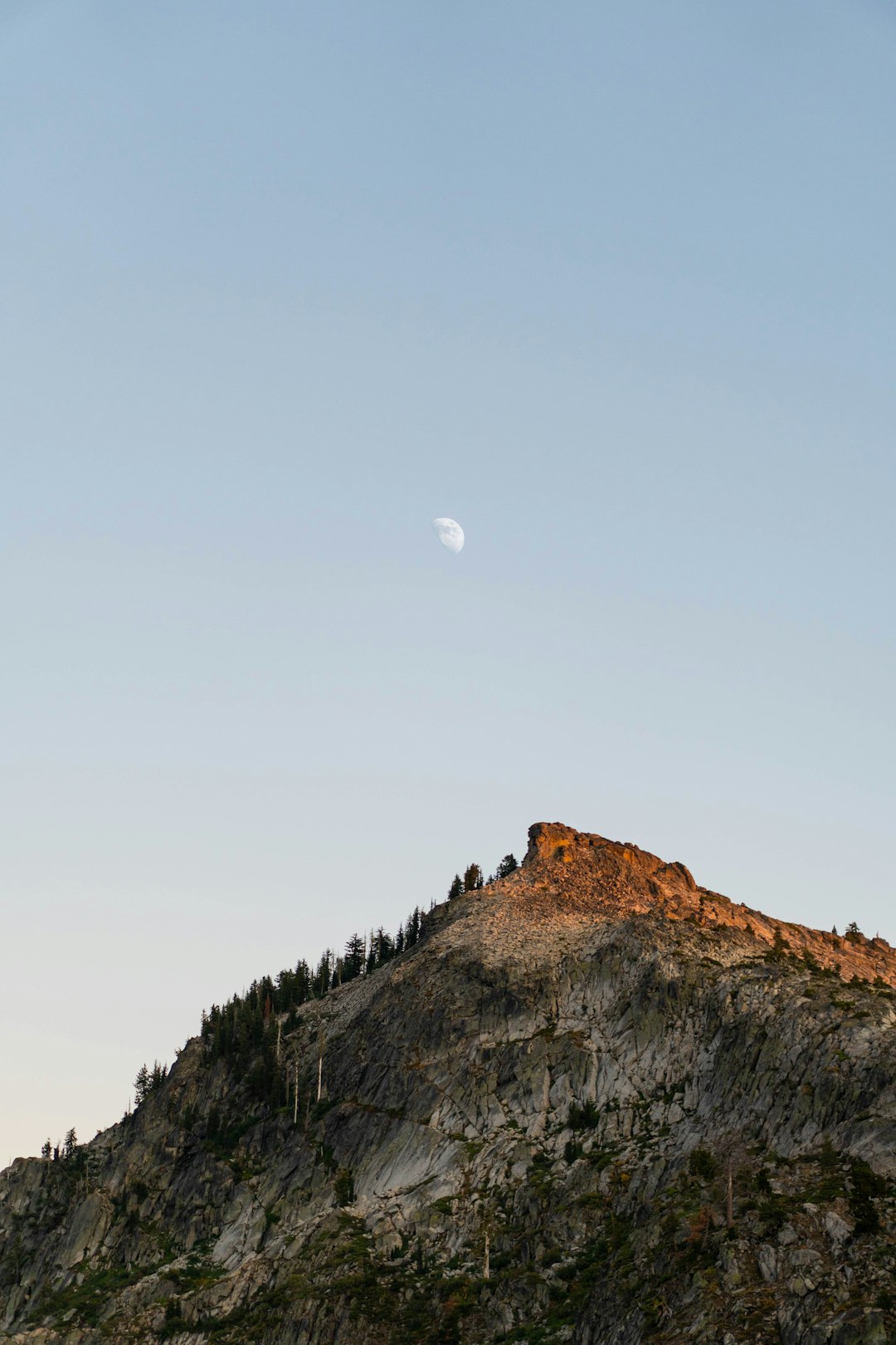 brown mountain under white sky