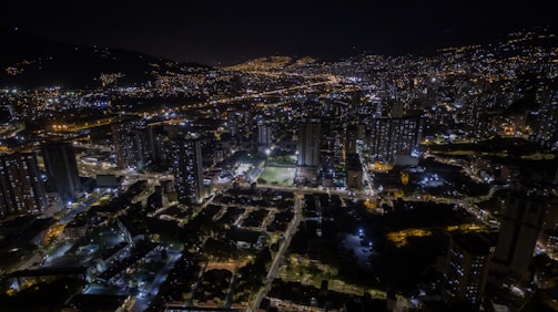 Nighttime cityscape of Los Angeles with digital overlays representing web connections.