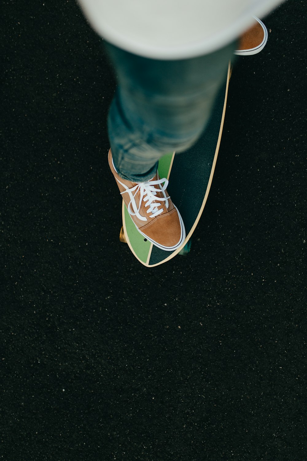 unpaired brown Vans shoe