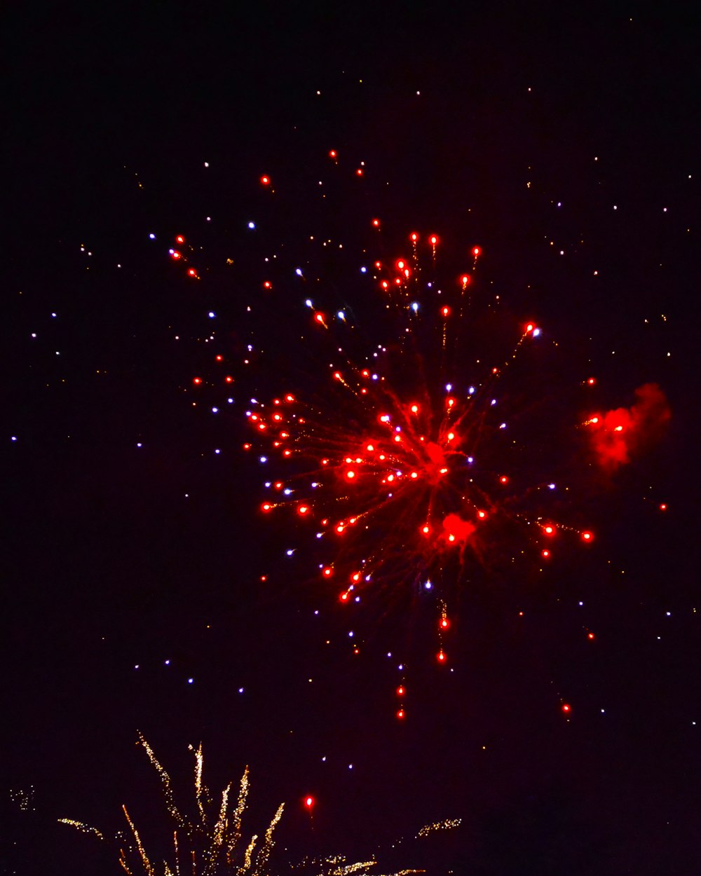 red fireworks at night