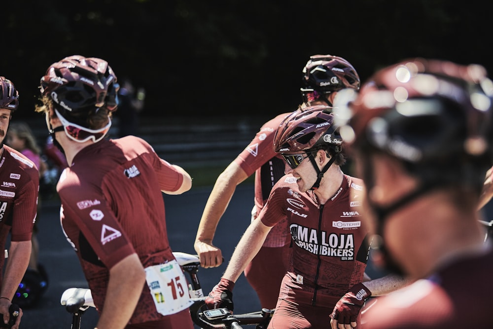 men riding bicycles during daytime