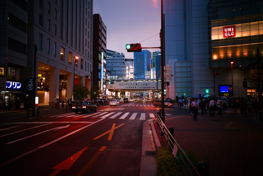 gray concrete road between buildings