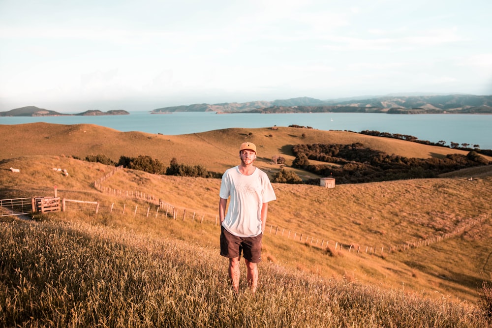 man standing on plains during daytime