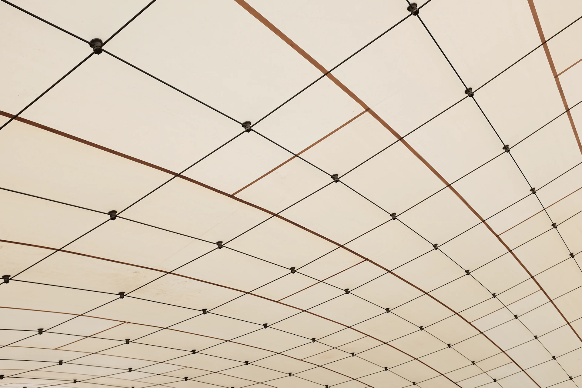 a room with a ceiling made of wires