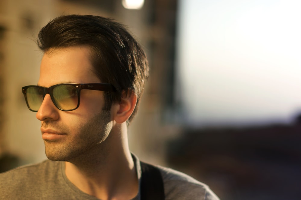 man wearing black framed sunglasses