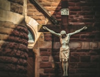 Why Catholics have crucifixes instead of crosses? Does it matter?