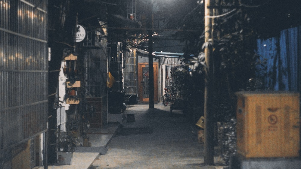 concrete pathway beside buildings